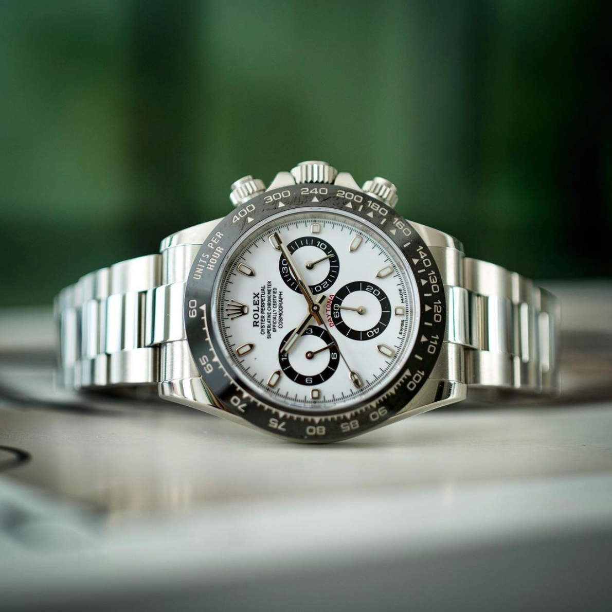 What do letters like BLNR, BLRO, CHNR mean in Rolex reference numbers?