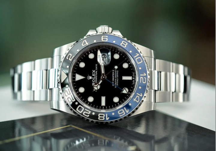What do letters like BLNR, BLRO, CHNR mean in Rolex reference numbers?